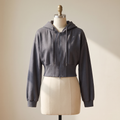 Felpa donna corta grigio scuro con cappuccio e zip integrale