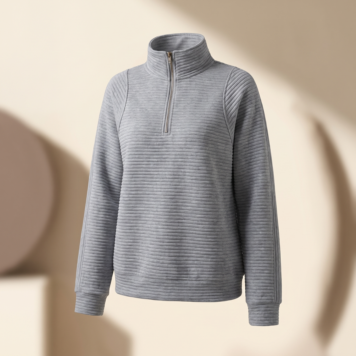 Felpa donna a coste con collo alto e mezza zip nel colore grigio