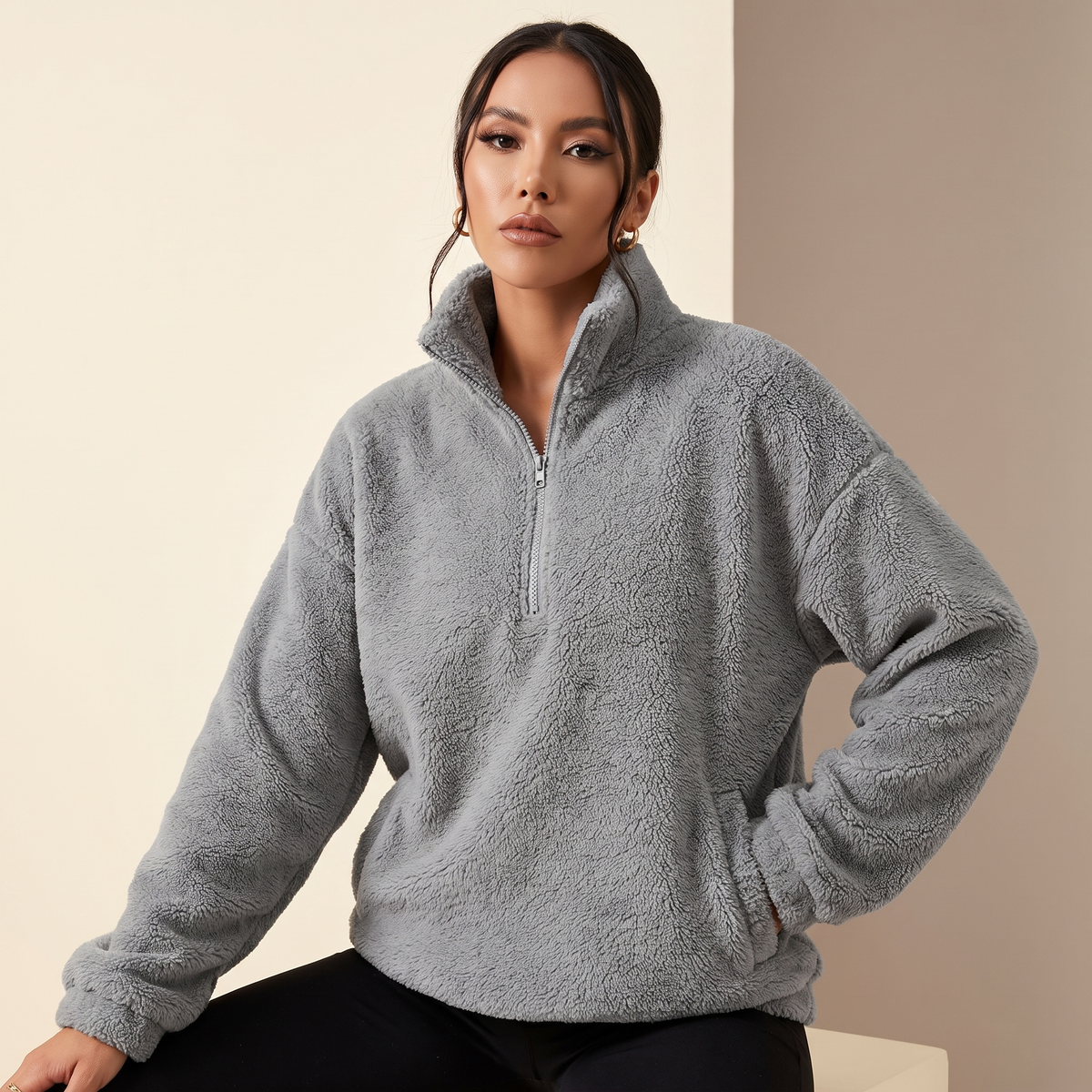 Felpa donna mezza zip collo alto con tasche nel colore grigio
